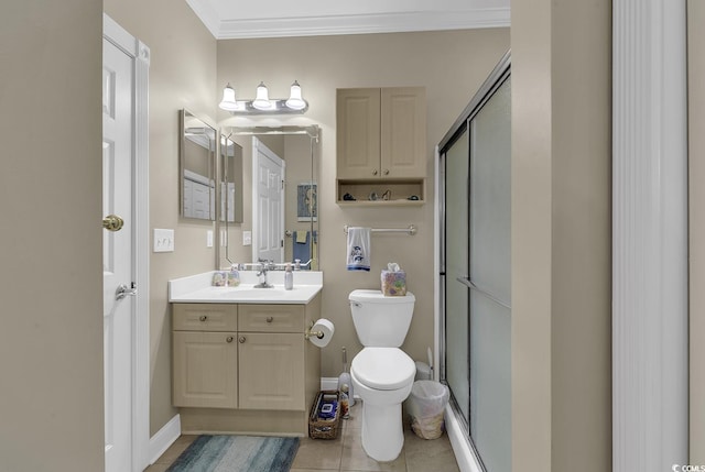 bathroom featuring a shower with door, ornamental molding, vanity, and toilet