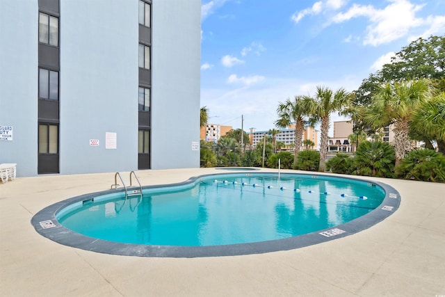 view of pool with a patio area