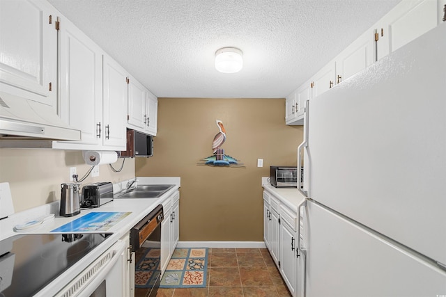 kitchen featuring sink, a textured ceiling, white cabinets, and white appliances