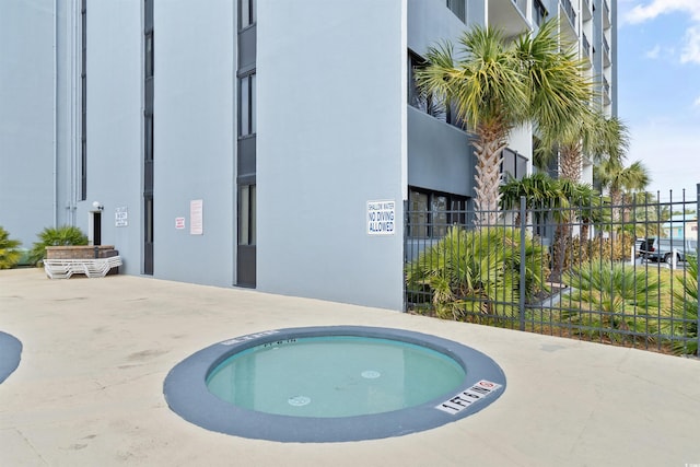 view of swimming pool featuring a patio