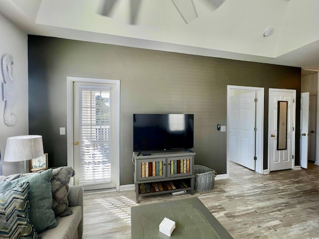 living room with light hardwood / wood-style flooring and plenty of natural light