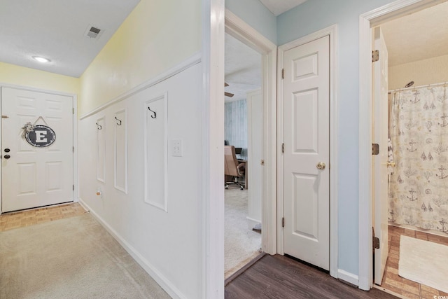 foyer with hardwood / wood-style floors