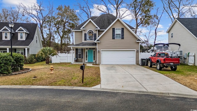 view of front of home featuring a garage and a front lawn