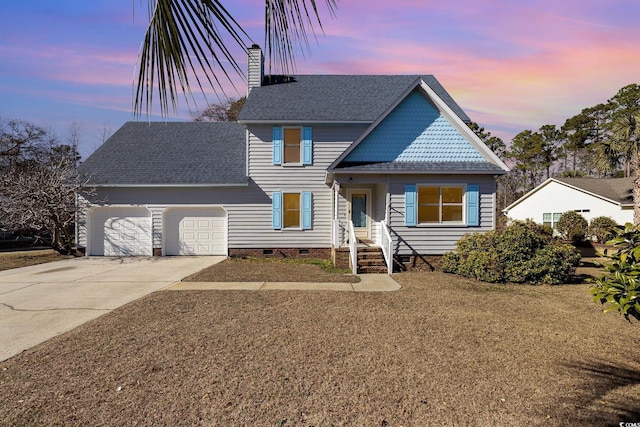 view of front of home with a garage