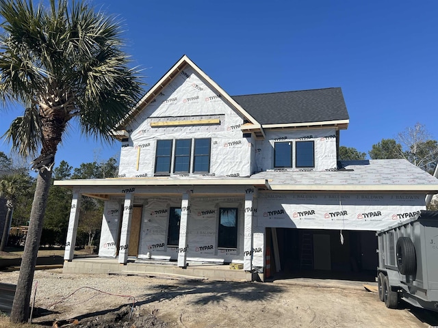 property in mid-construction featuring covered porch