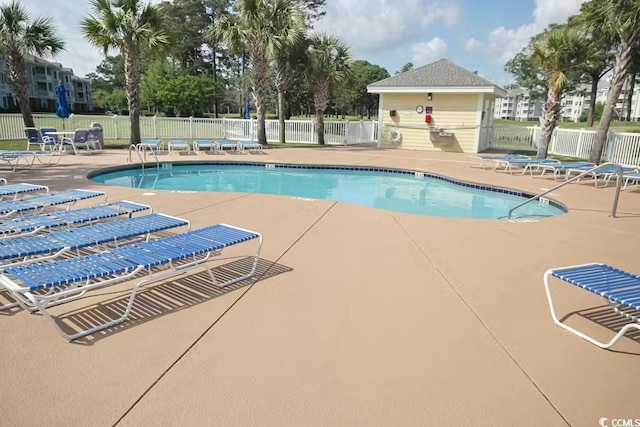 view of pool featuring a patio