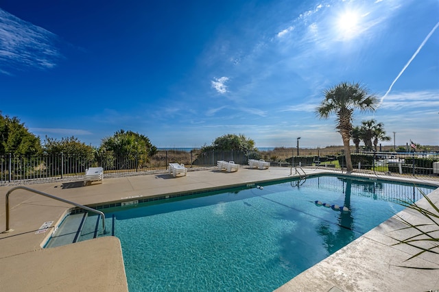 view of pool featuring a patio