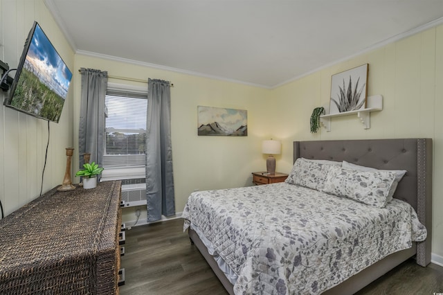 bedroom featuring crown molding and dark wood-type flooring