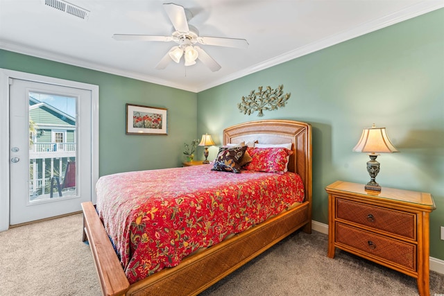 carpeted bedroom with ornamental molding, access to exterior, and ceiling fan