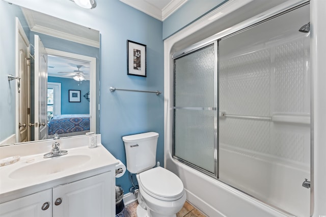 full bathroom featuring vanity, ornamental molding, enclosed tub / shower combo, and toilet