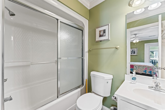 full bathroom featuring vanity, crown molding, bath / shower combo with glass door, and toilet