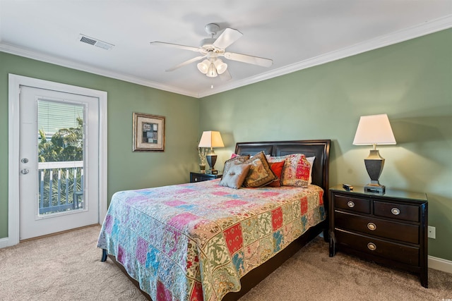 carpeted bedroom featuring ceiling fan, ornamental molding, and access to outside