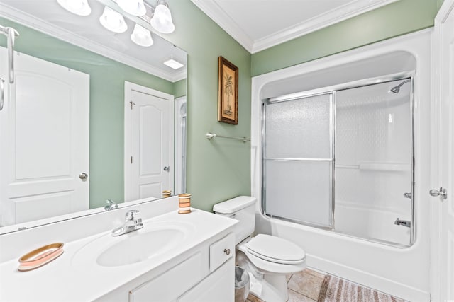 full bathroom with toilet, crown molding, shower / bath combination with glass door, vanity, and tile patterned flooring