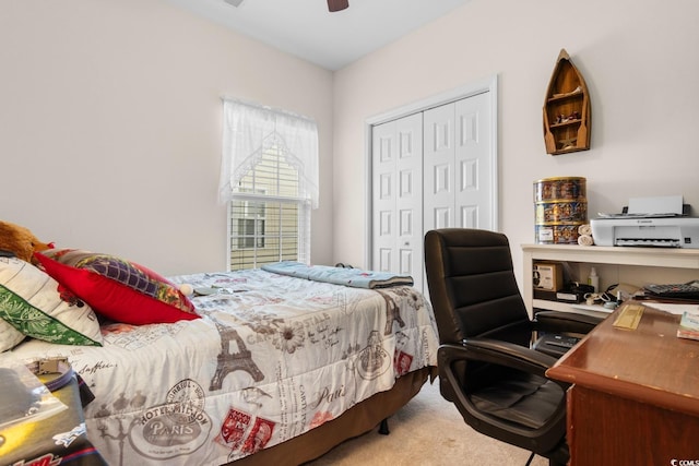 bedroom featuring carpet floors, a closet, and ceiling fan