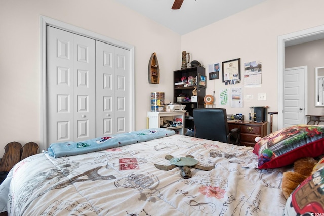 bedroom with ceiling fan and a closet