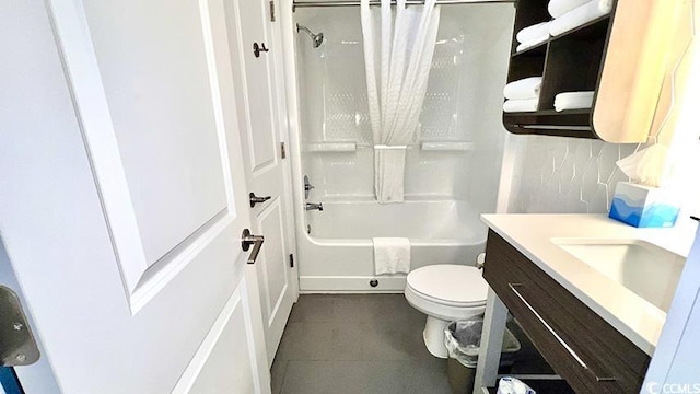 full bathroom with vanity, shower / bath combo, tile patterned floors, and toilet