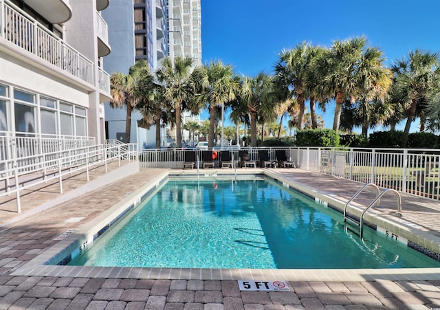 view of pool with a patio area