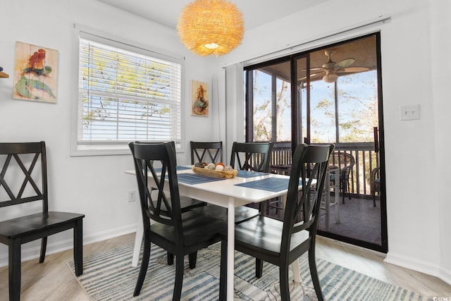 dining room featuring ceiling fan