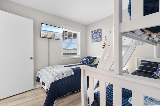 bedroom with light hardwood / wood-style flooring