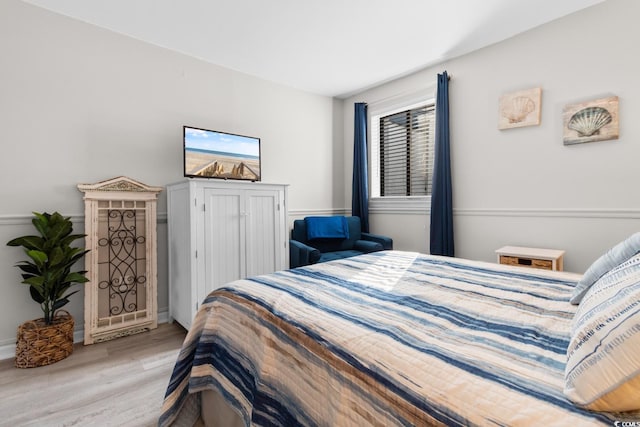 bedroom featuring light wood-type flooring