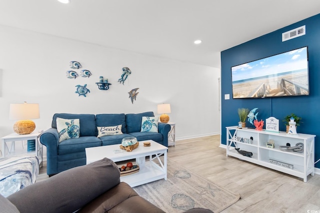 living room with wood-type flooring