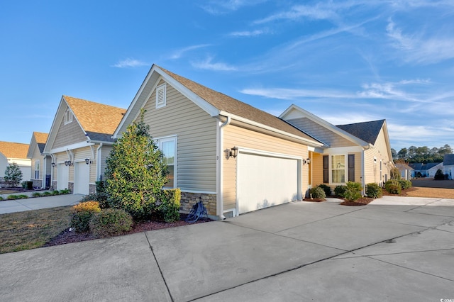 view of property exterior with a garage