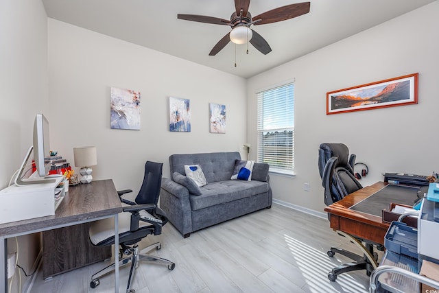 office featuring ceiling fan and light hardwood / wood-style floors