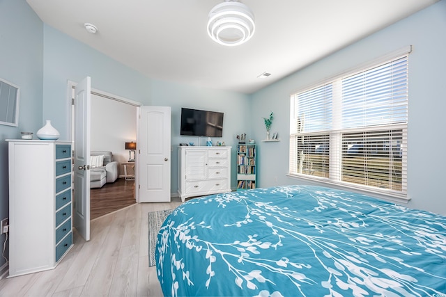 bedroom featuring hardwood / wood-style floors