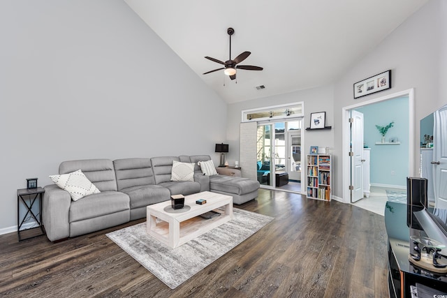 living room with dark wood-type flooring, high vaulted ceiling, and ceiling fan