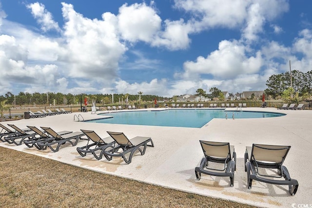 view of pool featuring a patio area