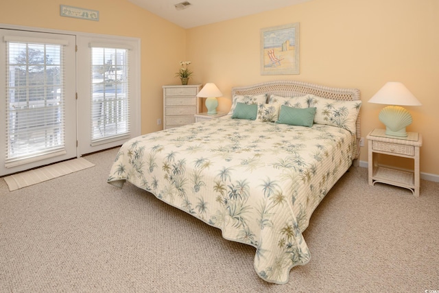 carpeted bedroom with access to exterior, lofted ceiling, visible vents, and baseboards