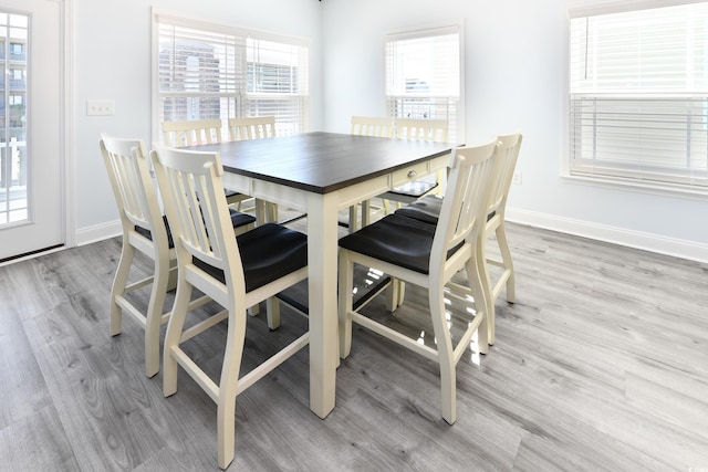 dining room featuring light wood-type flooring