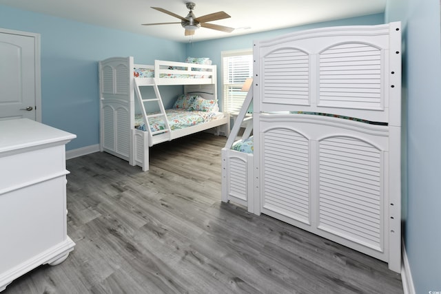 bedroom featuring ceiling fan and wood-type flooring