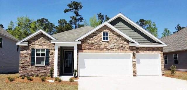 craftsman house with a garage