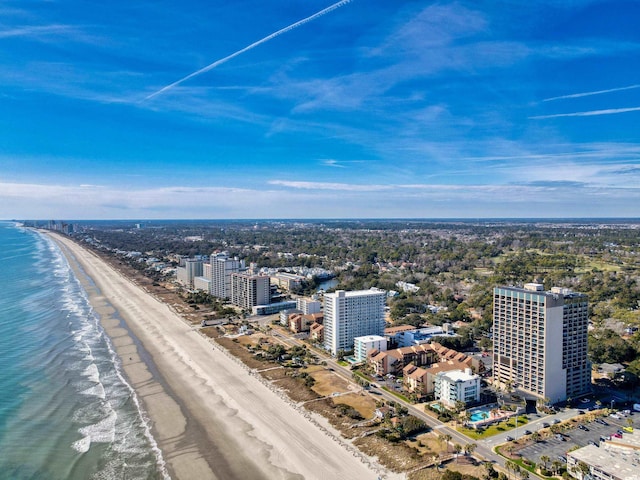 bird's eye view featuring a view of the beach and a water view