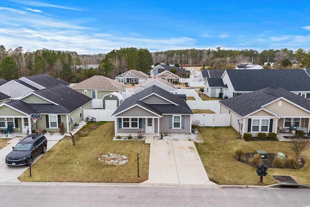 view of front of house with a front lawn and a porch