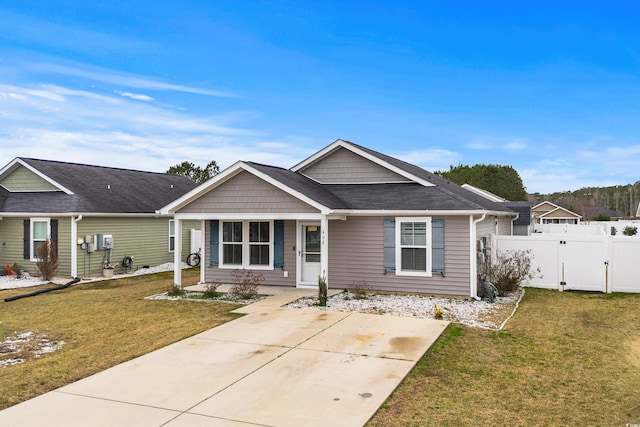 view of front of house with a porch and a front lawn