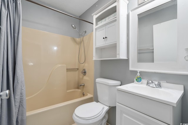 full bathroom with vanity, shower / bath combination with curtain, a textured ceiling, and toilet