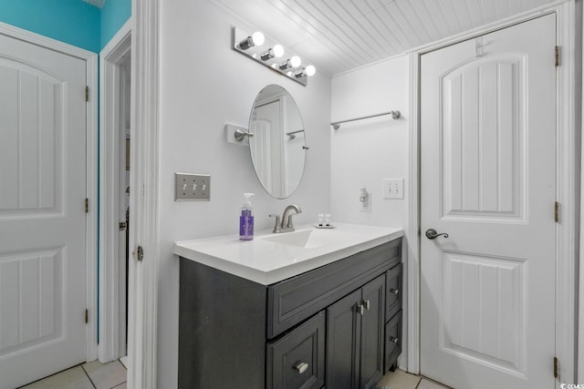 bathroom with vanity and tile patterned floors