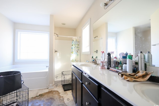 bathroom featuring a bath, double vanity, a sink, and a shower with shower curtain