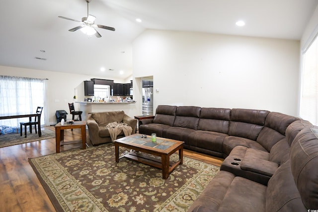 living room featuring recessed lighting, visible vents, ceiling fan, wood finished floors, and high vaulted ceiling