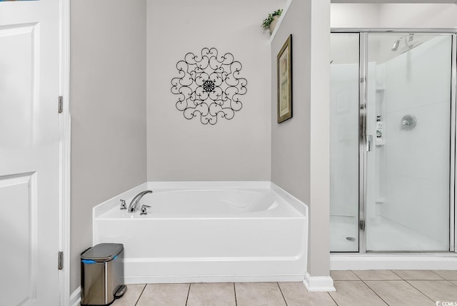 bathroom featuring tile patterned floors and plus walk in shower