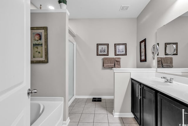 bathroom with vanity, separate shower and tub, and tile patterned floors