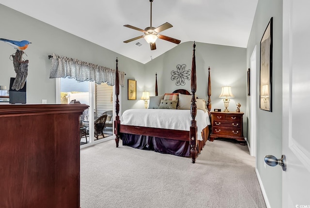 bedroom featuring light carpet, vaulted ceiling, and ceiling fan