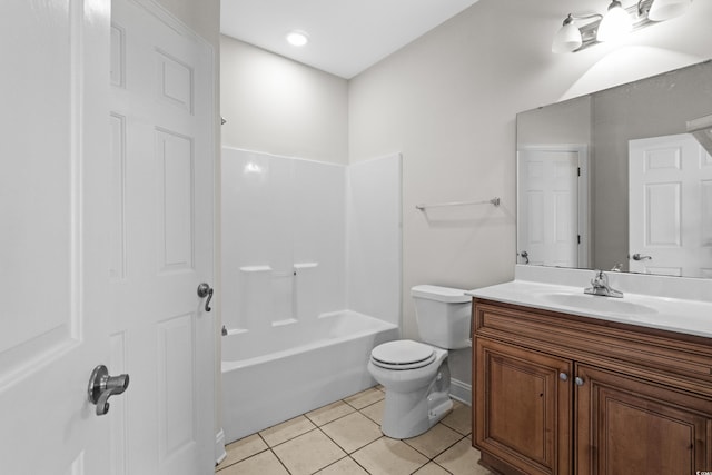 bathroom with shower / bath combination, vanity, toilet, and tile patterned floors