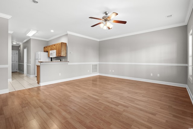 unfurnished living room with light wood-style floors, visible vents, and a ceiling fan