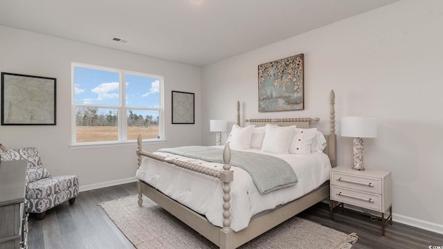 bedroom featuring dark wood-type flooring