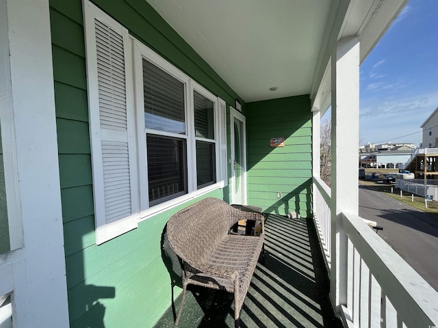 balcony featuring a porch