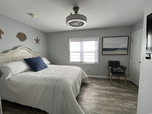 bedroom featuring dark hardwood / wood-style floors