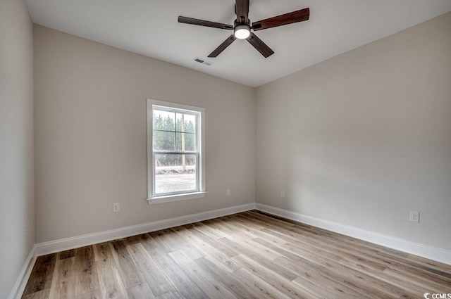 unfurnished room with ceiling fan and light hardwood / wood-style floors